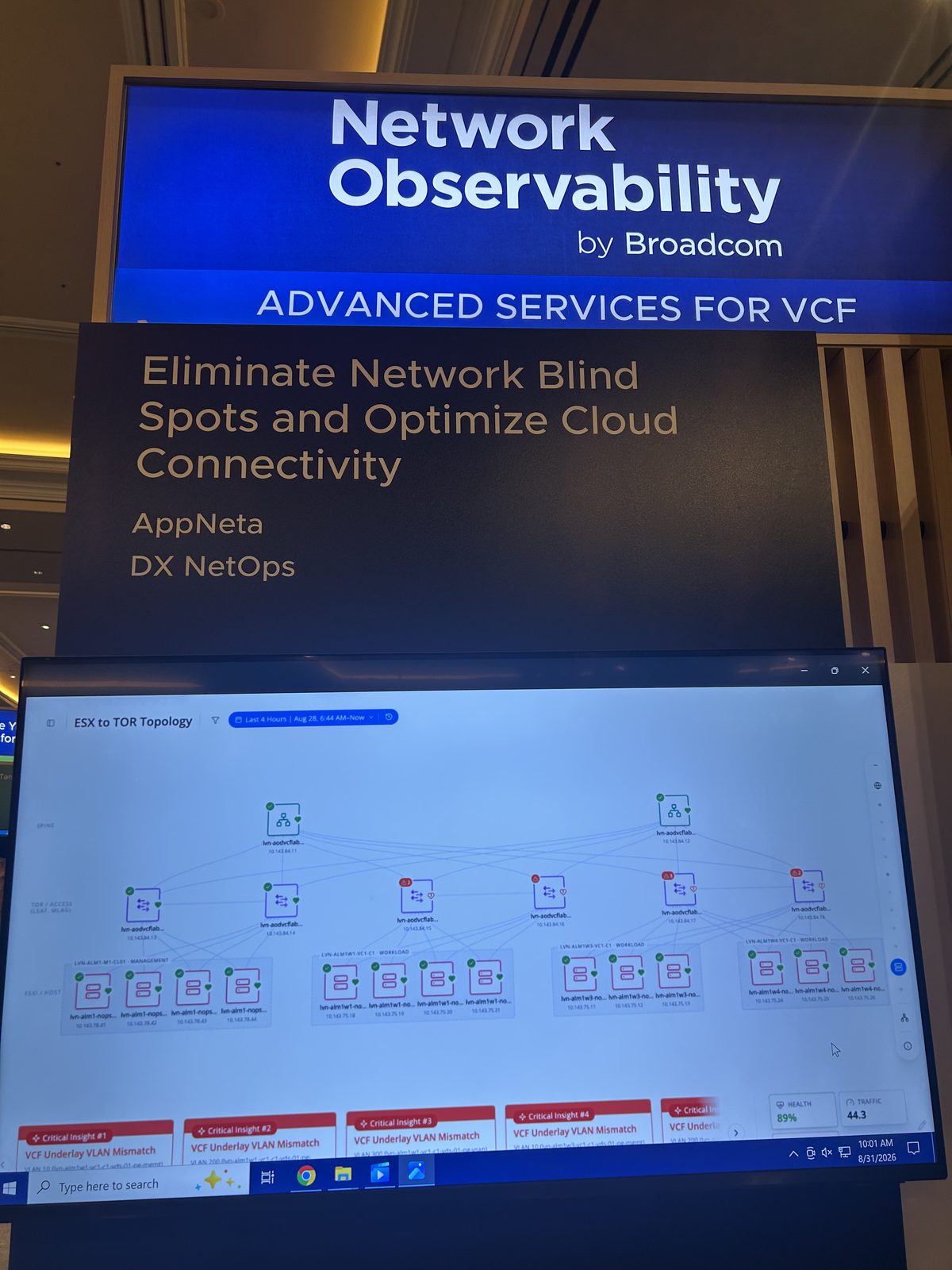 A network observability demo screen showing an ESX-to-top-of-rack topology map with critical VLAN mismatch insights