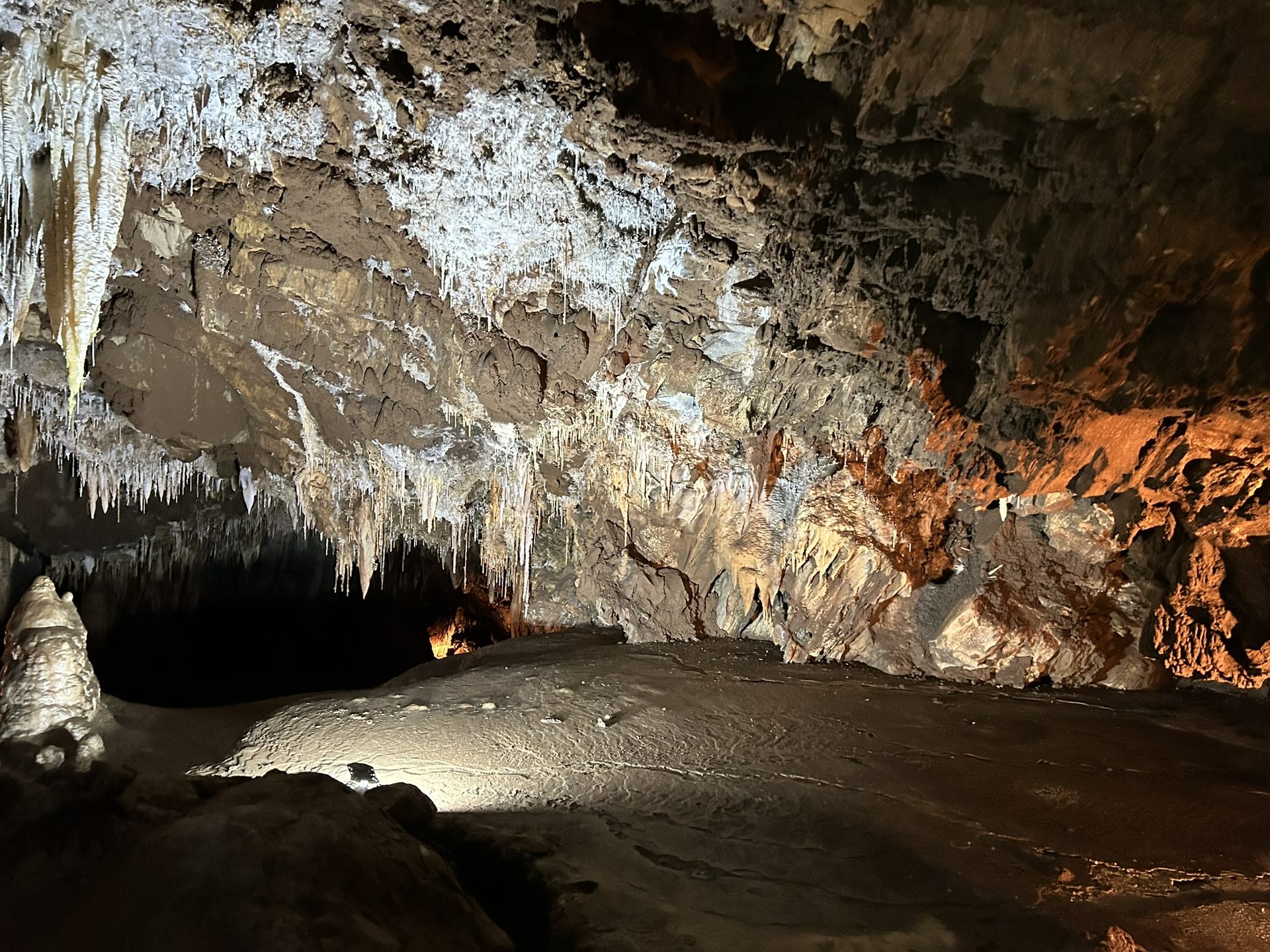 Stunning stalactite room with stalagmite cone centerpiece